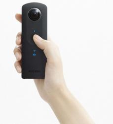 Ricoh Theta S Camera held